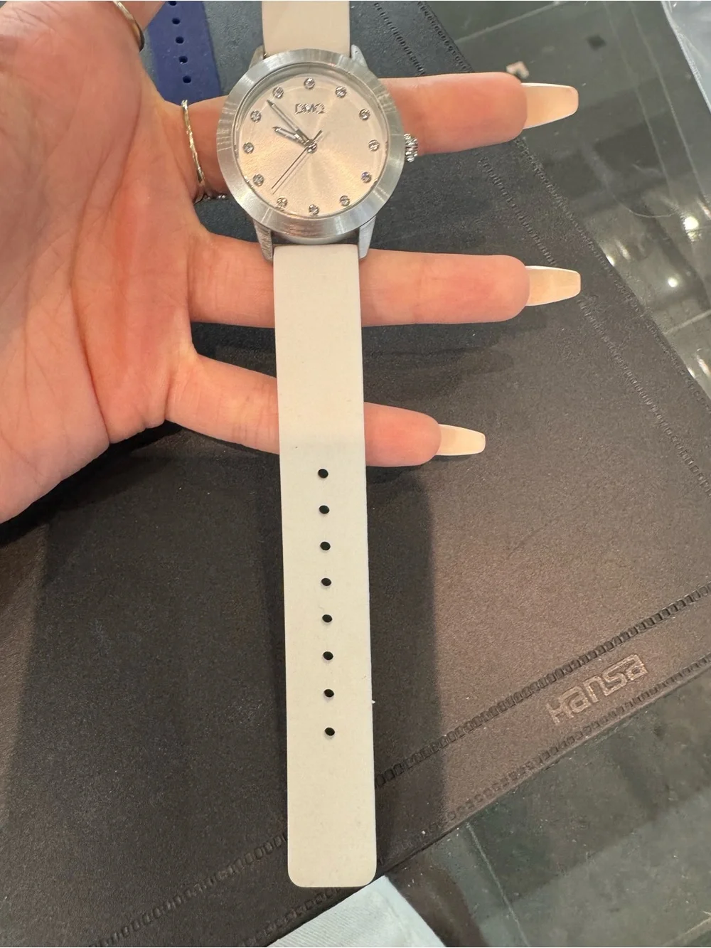 New DMQ Women’s silver tone & white Watch w Crystal Markers and rubber Strap.
